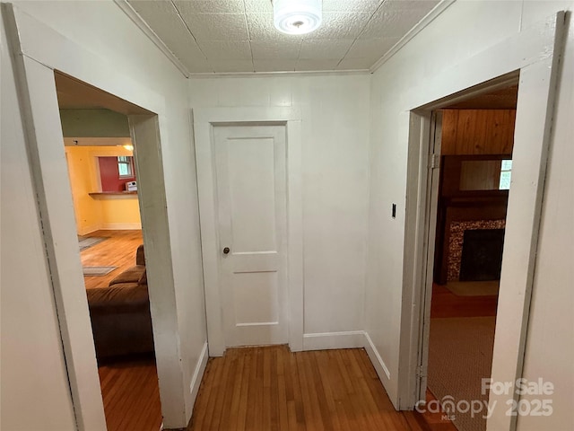 633 Ridge Rd, Marion, NC 28752 - hall featuring baseboards and wood finished floors