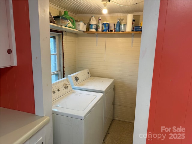 633 Ridge Rd, Marion, NC 28752 - laundry area with cabinet space, washing machine and dryer, and wooden walls