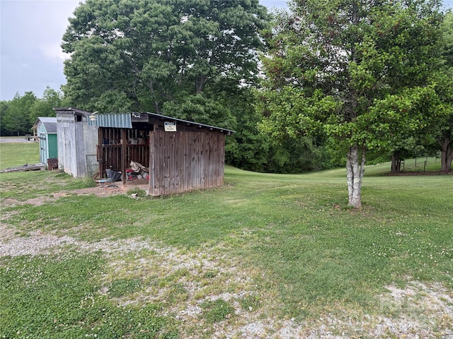633 Ridge Rd, Marion, NC 28752 - view of yard with a storage unit and an outdoor structure