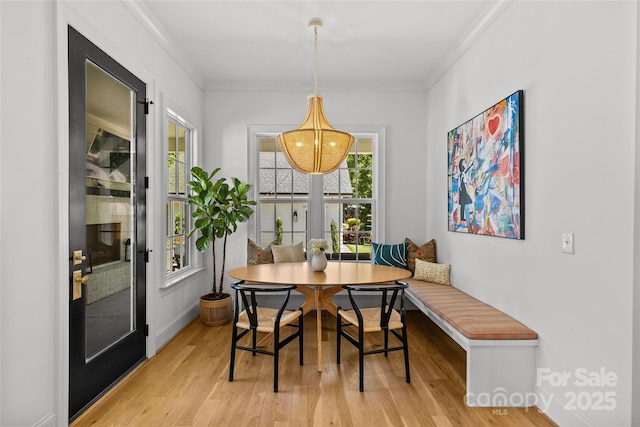 2509 Bay St, Charlotte, NC 28205 - dining space featuring breakfast area, light wood-style floors, ornamental molding, and baseboards