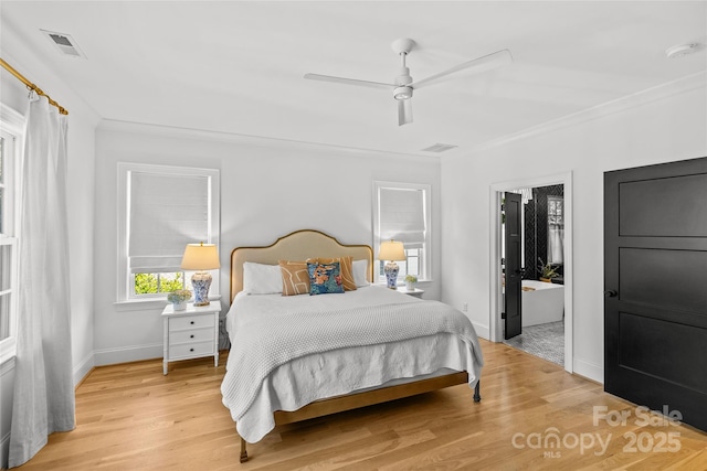 2509 Bay St, Charlotte, NC 28205 - bedroom featuring light wood-type flooring, baseboards, ornamental molding, and ceiling fan