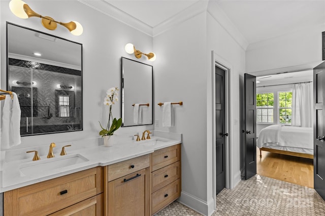 2509 Bay St, Charlotte, NC 28205 - ensuite bathroom with double vanity, a stall shower, crown molding, tile patterned flooring, and baseboards