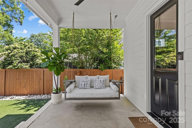 2509 Bay St, Charlotte, NC 28205 - covered porch with ceiling fan and a patio area