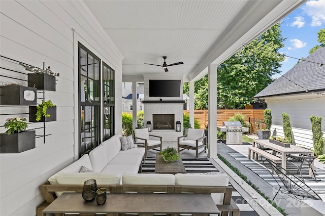 2509 Bay St, Charlotte, NC 28205 - view of patio with an outdoor living space with a fireplace, grilling area, and a ceiling fan