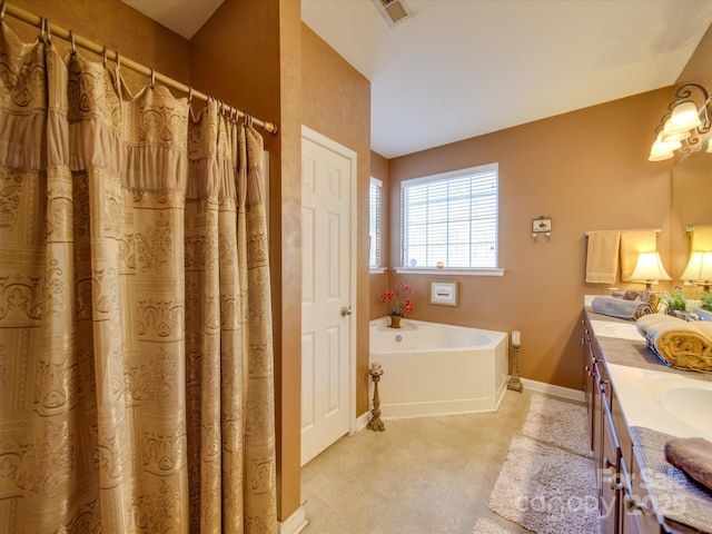5076 Timber Falls Dr, Indian Land, SC 29707 - bathroom featuring a garden tub, double vanity, visible vents, baseboards, and a shower with curtain