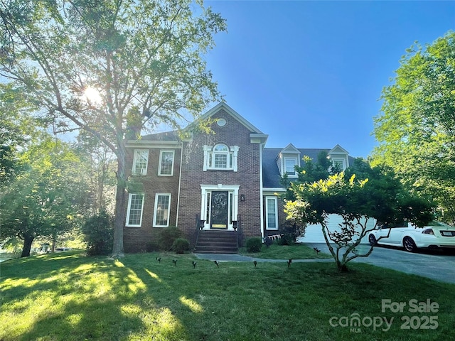 944 Evian Ln, Matthews, NC 28015 - view of front of house featuring a front yard and brick siding