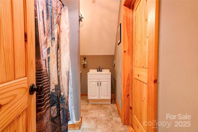 bathroom with tile patterned flooring and a sink