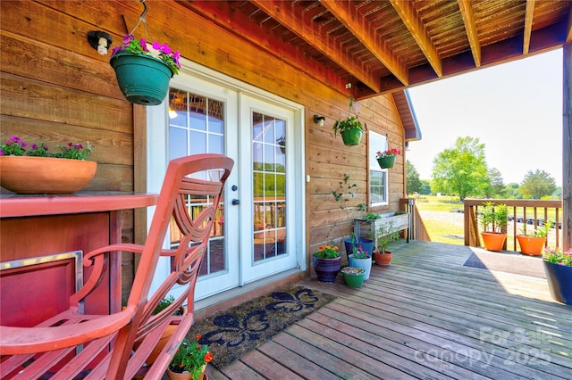 wooden deck with french doors