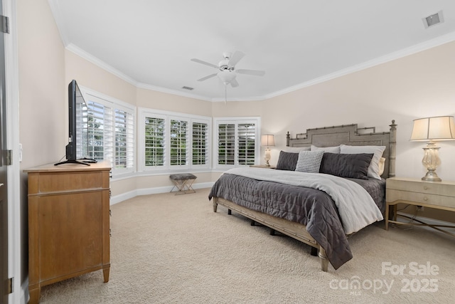 bedroom featuring ornamental molding, light carpet, and visible vents