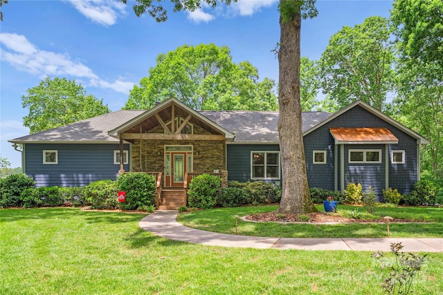 146 Paradise Peninsula Rd, Mooresville, NC 28117 - view of front of home featuring a shingled roof, a front lawn, and stone siding