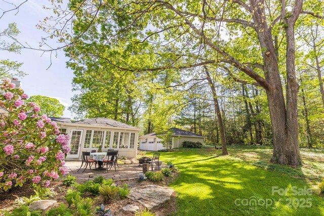 view of yard with a patio area