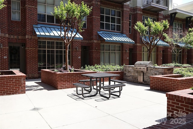 1101 W 1st St Unit 408, Charlotte, NC 28202 - view of patio / terrace featuring a grill and area for grilling