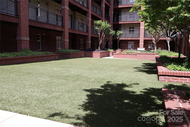 1101 W 1st St Unit 408, Charlotte, NC 28202 - view of community featuring a lawn