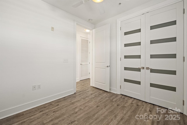 1101 W 1st St Unit 408, Charlotte, NC 28202 - entryway with wood finished floors, baseboards, and a ceiling fan