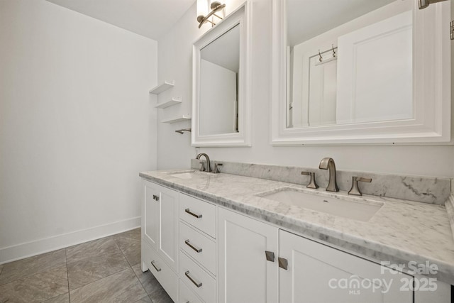 1101 W 1st St Unit 408, Charlotte, NC 28202 - bathroom with baseboards and double vanity
