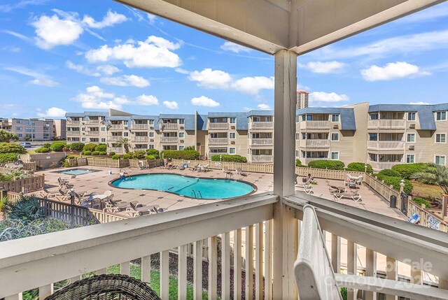 9660 Shore Dr Unit 208, Myrtle Beach, SC 29572 - balcony with a patio