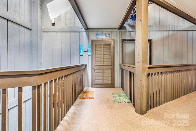 9660 Shore Dr Unit 208, Myrtle Beach, SC 29572 - corridor featuring wooden walls and carpet floors