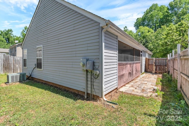 view of property exterior featuring central AC