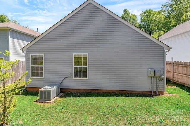 view of home's exterior with cooling unit