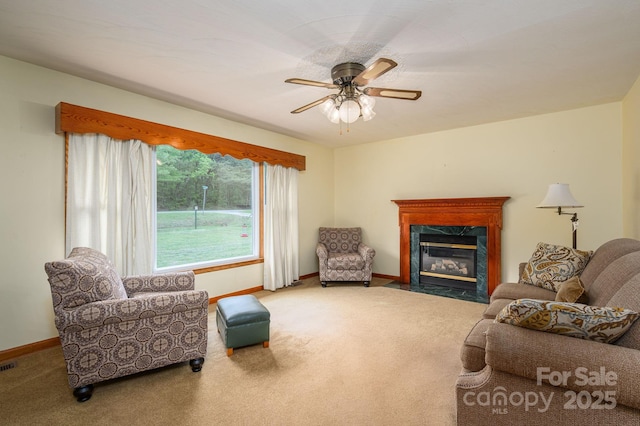 115 Patterson Rd, Kings Mountain, NC 28086 - carpeted living room with a premium fireplace and a ceiling fan