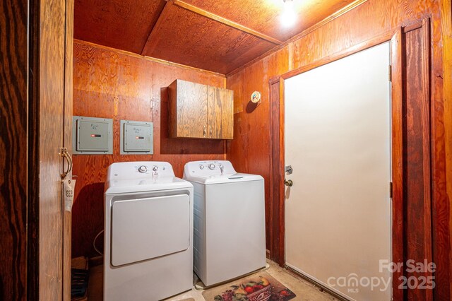 115 Patterson Rd, Kings Mountain, NC 28086 - laundry room with cabinet space, washer and clothes dryer, and wood walls