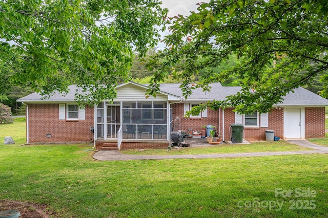 115 Patterson Rd, Kings Mountain, NC 28086 - rear view of property with a sunroom, brick siding, a lawn, and a shingled roof