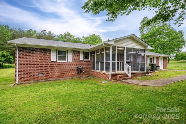 115 Patterson Rd, Kings Mountain, NC 28086 - rear view of house with a sunroom, brick siding, and a lawn