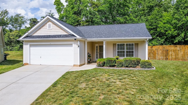 6808 Squirrels Foot Ct, Charlotte, NC 28217 - view of front of house with an attached garage, fence, driveway, a front yard, and roof with shingles
