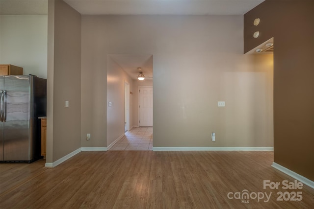 6808 Squirrels Foot Ct, Charlotte, NC 28217 - interior space with baseboards and light wood-style floors