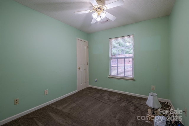 6808 Squirrels Foot Ct, Charlotte, NC 28217 - unfurnished room featuring visible vents, baseboards, a ceiling fan, and dark carpet