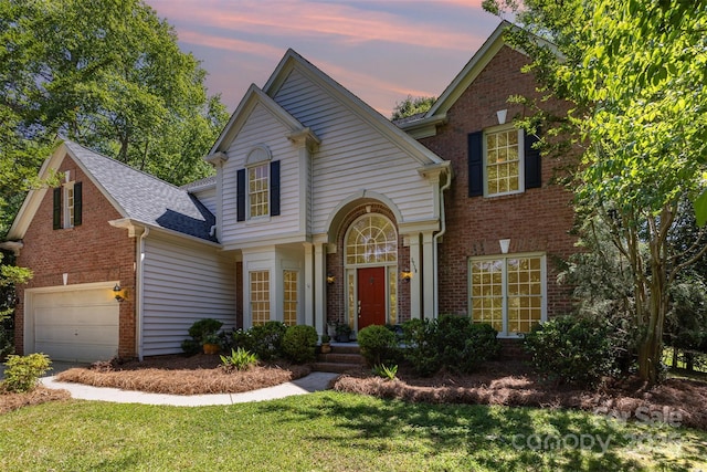3710 Cheleys Ridge Ln, Charlotte, NC 28270 - traditional home with brick siding, a front lawn, roof with shingles, and an attached garage