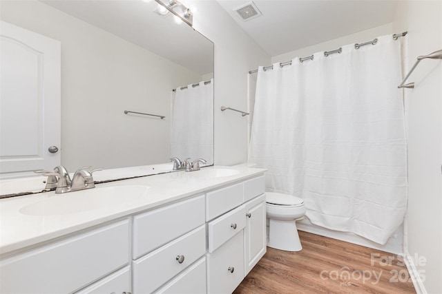 3710 Cheleys Ridge Ln, Charlotte, NC 28270 - full bath featuring wood finished floors, double vanity, toilet, and a shower with curtain
