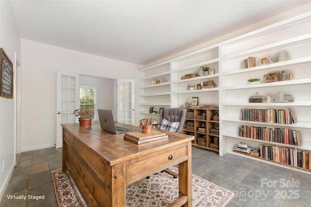 3710 Cheleys Ridge Ln, Charlotte, NC 28270 - office area with dark tile patterned flooring and baseboards