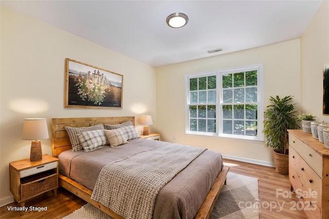 3710 Cheleys Ridge Ln, Charlotte, NC 28270 - bedroom with wood finished floors and baseboards