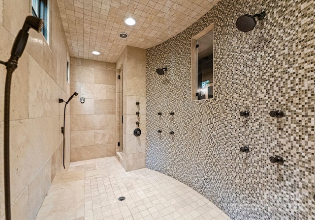 172 Tennessee Cir, Mooresville, NC 28117 - full bathroom featuring tiled shower, recessed lighting, and tile walls