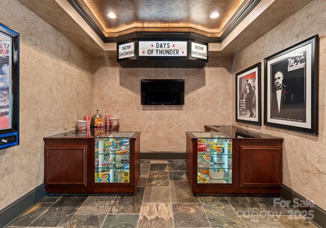 172 Tennessee Cir, Mooresville, NC 28117 - bar featuring baseboards, a raised ceiling, crown molding, and stone tile floors