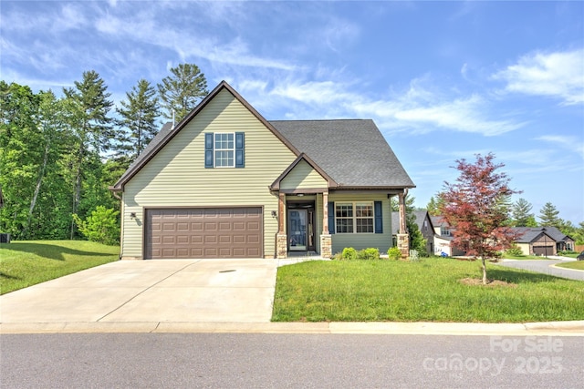 133 Water Leaf Dr, Weaverville, NC 28787 - view of front of home featuring an attached garage, a front lawn, and concrete driveway