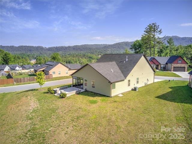 133 Water Leaf Dr, Weaverville, NC 28787 - aerial perspective of suburban area with a forest and a mountain backdrop