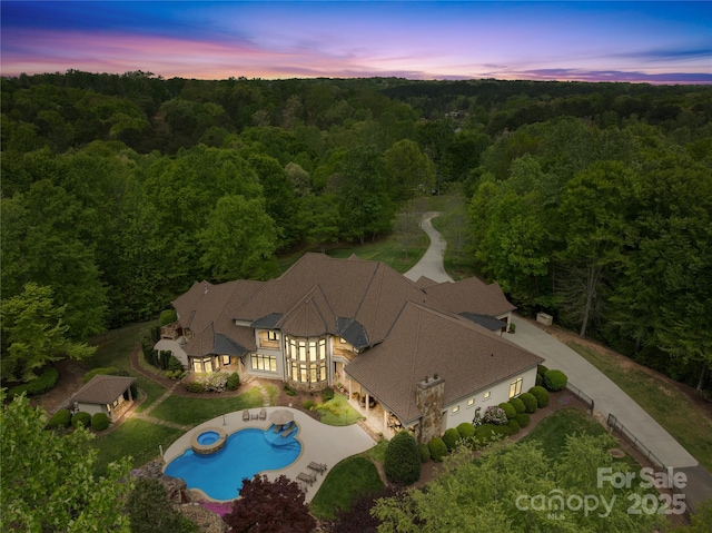 8451 Ridgewood Rd, Sherrills Ford, NC 28673 - aerial view at dusk with a wooded view