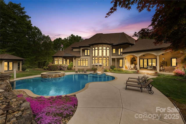 8451 Ridgewood Rd, Sherrills Ford, NC 28673 - pool at dusk with a storage structure, a patio, french doors, a lawn, and an outbuilding