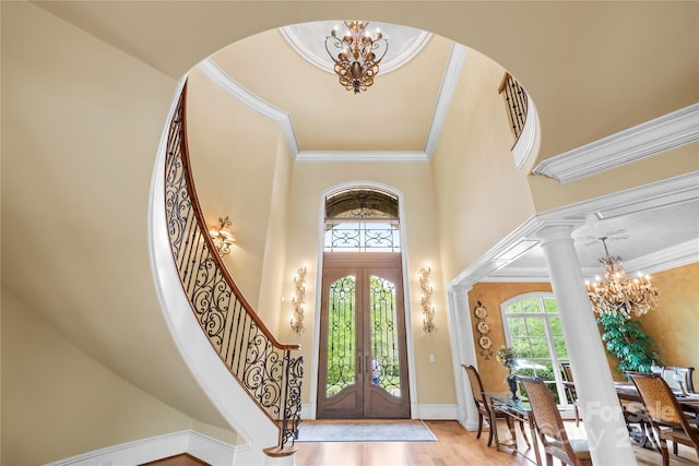 8451 Ridgewood Rd, Sherrills Ford, NC 28673 - foyer entrance featuring an inviting chandelier, ornamental molding, a high ceiling, stairway, and french doors