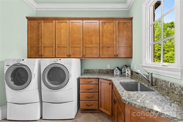 8451 Ridgewood Rd, Sherrills Ford, NC 28673 - laundry area with a healthy amount of sunlight, washing machine and clothes dryer, cabinet space, a sink, and ornamental molding