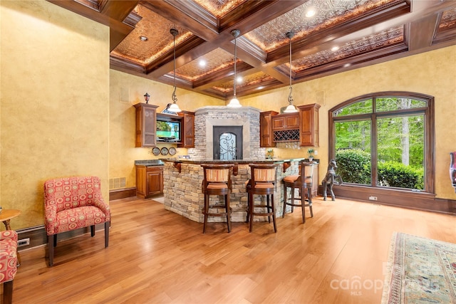 8451 Ridgewood Rd, Sherrills Ford, NC 28673 - bar with ornamental molding, beamed ceiling, light wood-type flooring, and visible vents