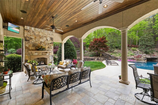 8451 Ridgewood Rd, Sherrills Ford, NC 28673 - view of patio / terrace featuring an outdoor living space with a fireplace, ceiling fan, and an outdoor pool