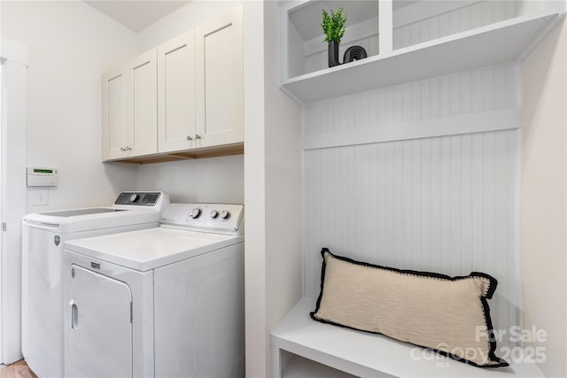 2638 Double Oaks Rd, Charlotte, NC 28206 - laundry room featuring washer and clothes dryer and cabinet space