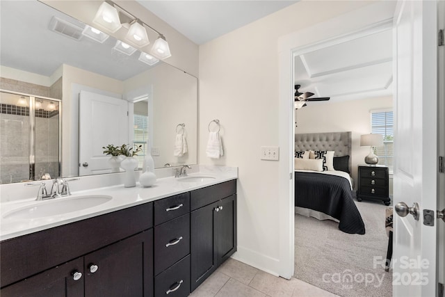 2638 Double Oaks Rd, Charlotte, NC 28206 - bathroom featuring ensuite bathroom, a stall shower, tile patterned floors, double vanity, and ceiling fan
