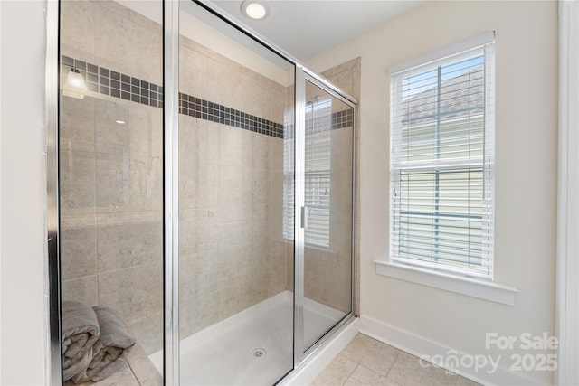2638 Double Oaks Rd, Charlotte, NC 28206 - bathroom with tile patterned flooring, a shower stall, and plenty of natural light