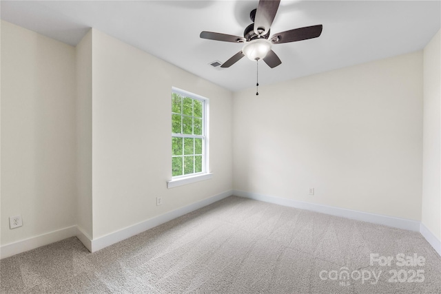 2638 Double Oaks Rd, Charlotte, NC 28206 - empty room featuring carpet, a ceiling fan, and baseboards