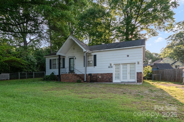 1108 Old Dallas Hwy, Dallas, NC 28034 - single story home with brick siding, fence, french doors, and a front lawn