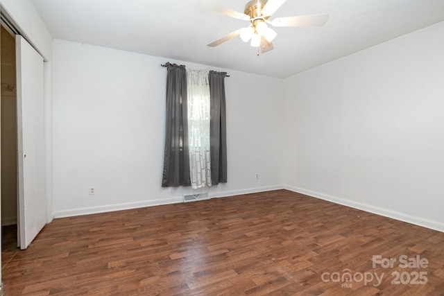 1108 Old Dallas Hwy, Dallas, NC 28034 - unfurnished bedroom with baseboards, visible vents, wood finished floors, and a closet
